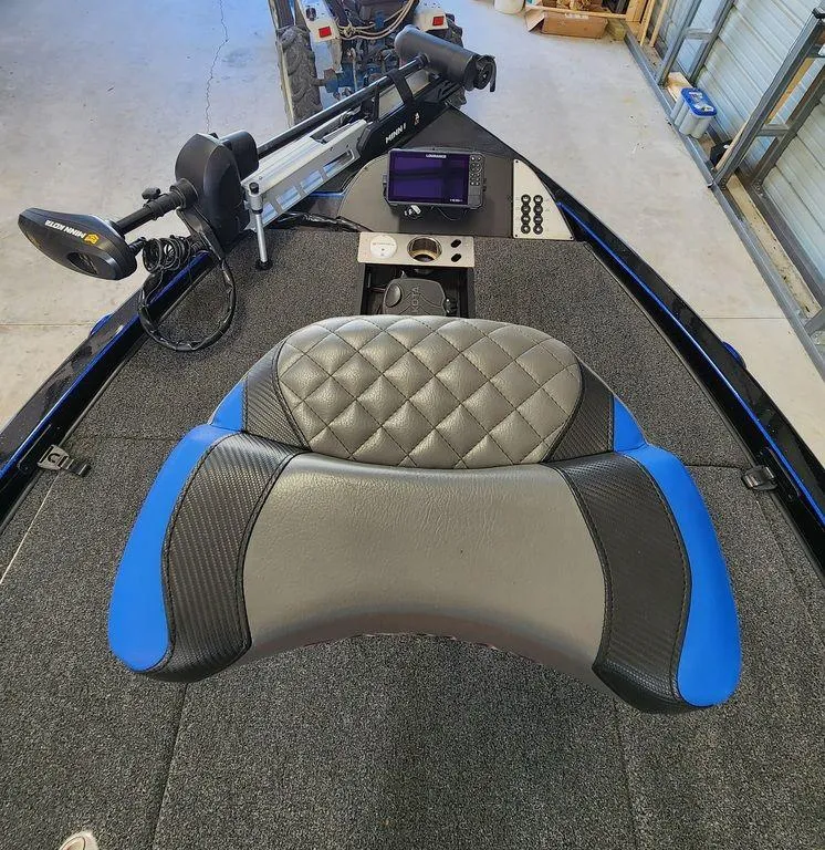 Slide: The Image of 2020 Caymas CX 20 boat interior with modern seating and advanced navigation system. - 15