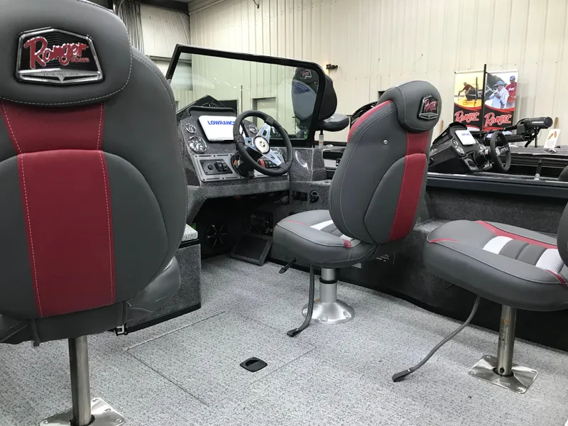 Slide: The Image of 2024 Ranger VS1782SC Angler boat interior with steering console and seating. - 11