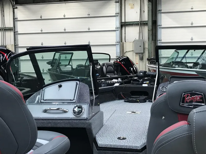 Slide: The Image of 2024 Ranger VS1782SC Angler trailer hitch and winch system in a garage. - 9