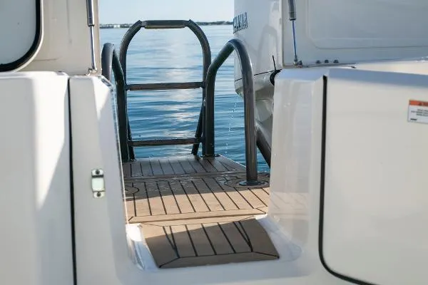 Slide: The Image of 2022 World Cat 400CC-X boat swim platform with ladder. - 14