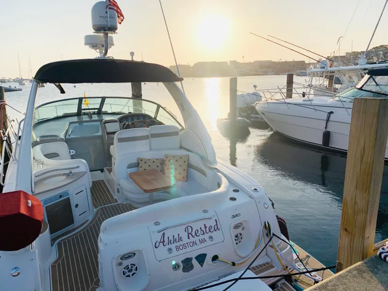 Slide: The Image of 2007 Sea Ray 320 Sundancer docked at sunset, Boston harbor. - 8