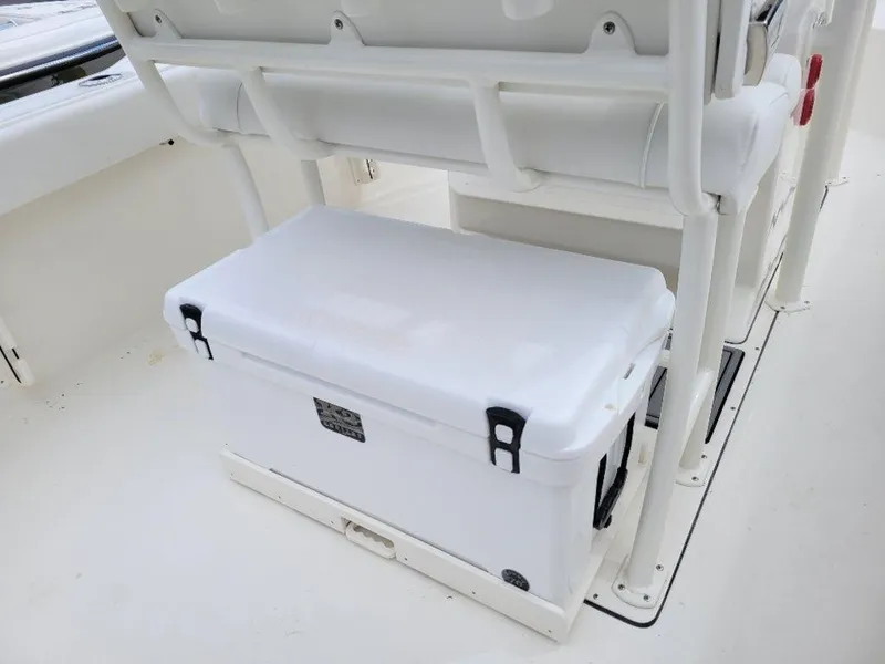 Slide: The Image of 2024 Key West 244 CC boat with white cooler under seat. - 16