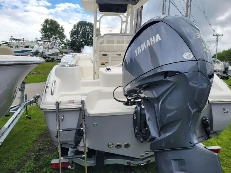 Slide: The Image of 2024 Key West 244 CC boat with Yamaha outboard motor, rear view. - 6