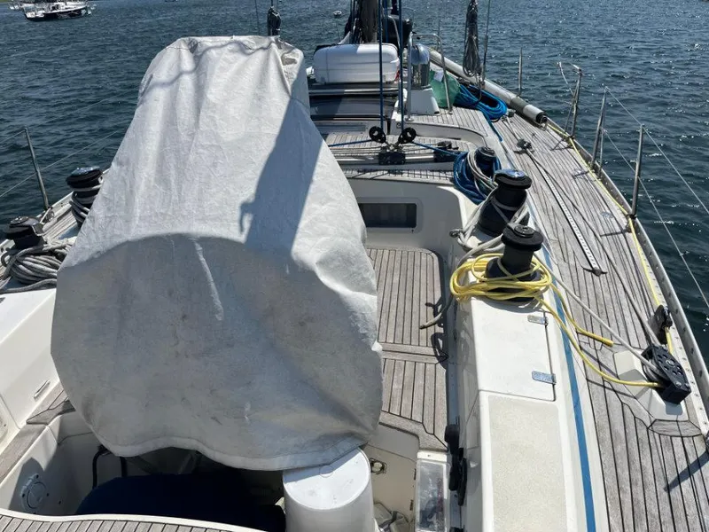 Slide: The Image of Sailing yacht deck of 1986 Nautor Swan 43, featuring winches and covered equipment. - 15