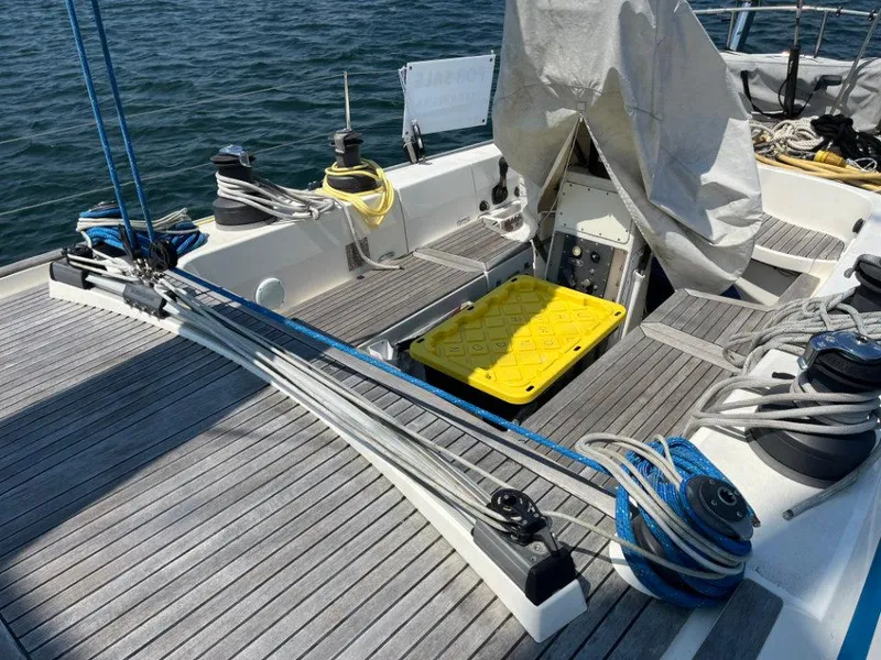 Slide: The Image of Nautor Swan 43 sailboat deck, 1986 model, featuring winches and rigging on a sunny day. - 16