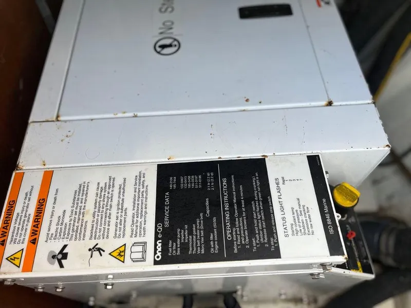 Slide: The Image of Electrical panel with warning labels on a 1986 Nautor Swan 43 yacht. - 31