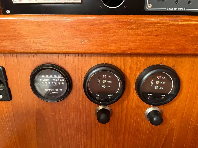 Slide: The Image of Control panel of a 1986 Nautor Swan 43 yacht with gauges and switches. - 32