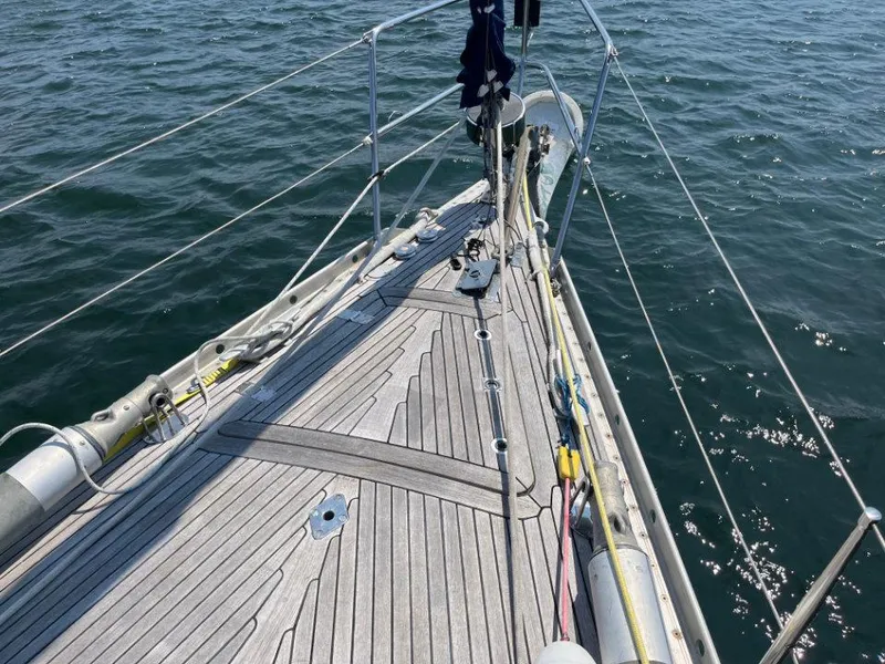 Slide: The Image of Deck view of 1986 Nautor Swan 43 sailboat on open water. - 4