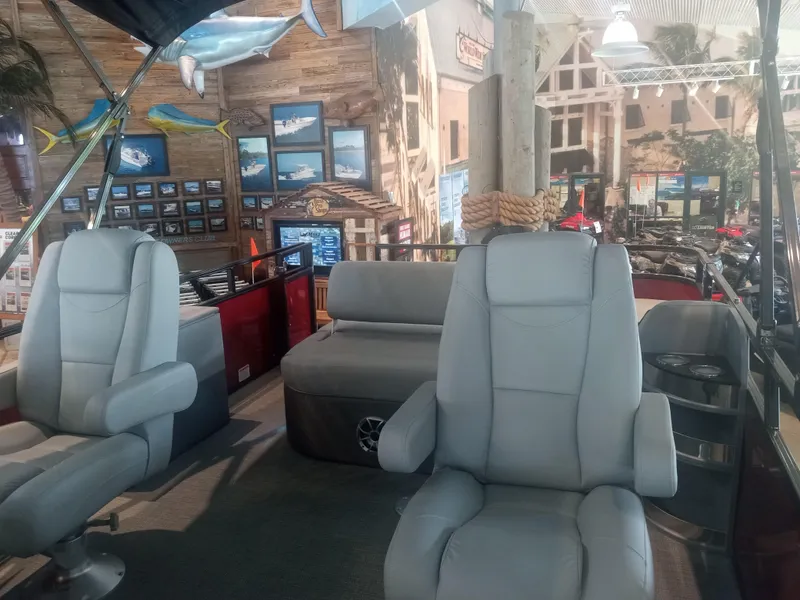 Slide: The Image of 2024 Regency 250 DL3 pontoon boat on trailer, side view. - 4