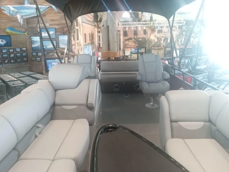 Slide: The Image of 2024 Regency 250 DL3 pontoon boat interior layout, top view. - 7