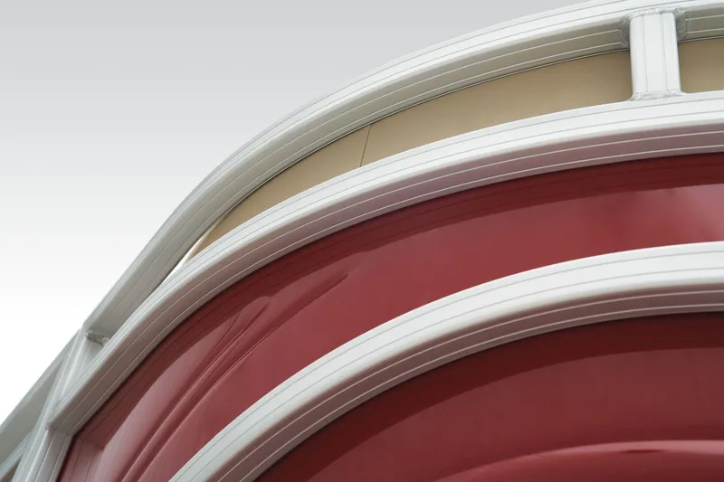 Slide: The Image of Close-up of 2024 Sun Tracker Party Barge 22 XP3 red exterior detailing. - 15