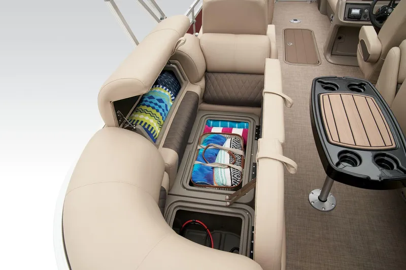 Slide: The Image of Sun Tracker Party Barge 22 XP3 2024 interior storage compartments with seating and table. - 47