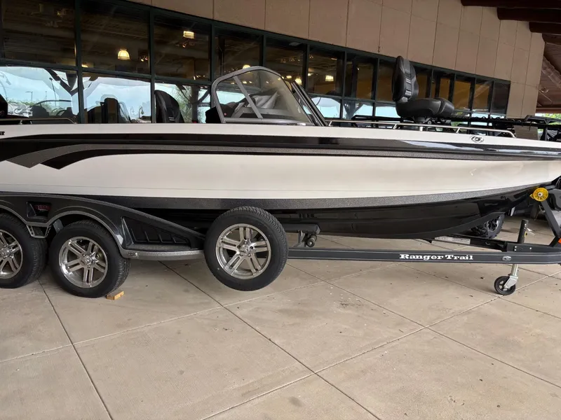 The Image of 2024 Ranger 621FS Cup-Equipped boat on trailer, side view, outdoors. - 0