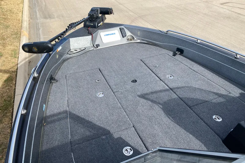 Slide: The Image of 2024 Ranger 621FS Cup-Equipped boat deck with Lowrance equipment and trolling motor. - 6