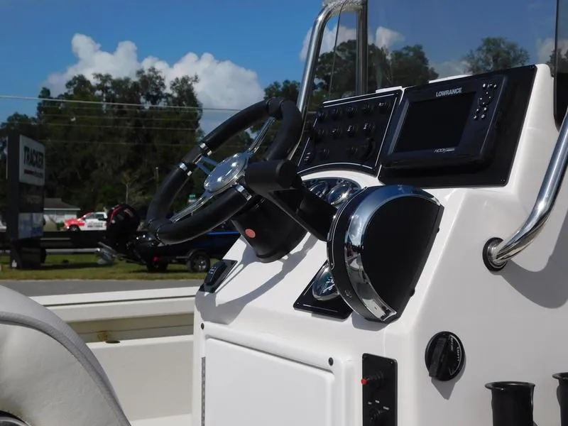 Slide: The Image of 2024 Ranger RB200 boat console with steering wheel and navigation system. - 5