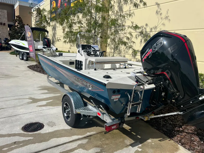 Slide: The Image of 2024 Ranger RB190 boat with Mercury 115 outboard motor on trailer. - 3