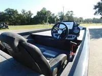 Slide: The Image of 2024 Ranger RT188 boat interior with steering wheel and dashboard. - 3