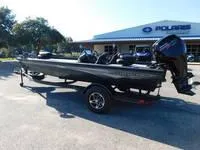 Slide: The Image of 2024 Ranger RT188 fishing boat on trailer outside dealership. - 4