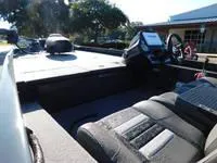 Slide: The Image of 2024 Ranger RT188 fishing boat interior with seating and control console. - 6