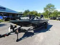 Slide: The Image of 2024 Ranger RT188 fishing boat on a trailer in a dealership lot. - 9