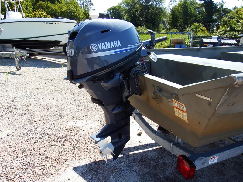 Slide: The Image of 2018 Polar Kraft Jon 1448 LW boat with Yamaha outboard motor on trailer. - 17