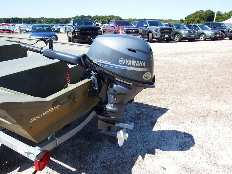 Slide: The Image of 2018 Polar Kraft Jon 1448 LW boat with Yamaha outboard motor in parking lot. - 19