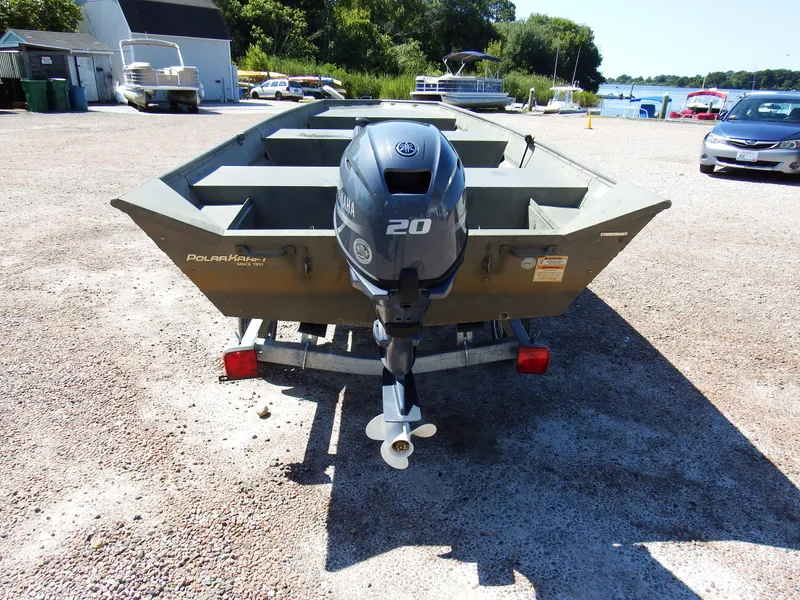 Slide: The Image of 2018 Polar Kraft Jon 1448 LW boat with 20 HP outboard motor on trailer. - 5