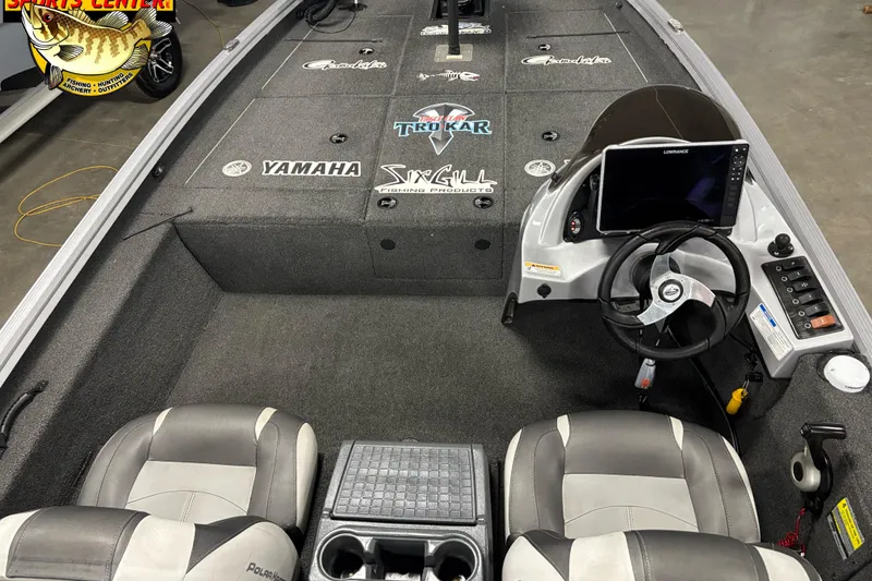 Slide: The Image of 2018 Polar Kraft TX 195 boat interior with steering console and branded deck. - 5