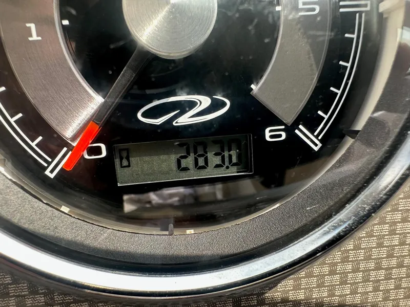 Slide: The Image of Close-up of 2015 Regal 1900 boat speedometer showing 283.0 hours. - 14
