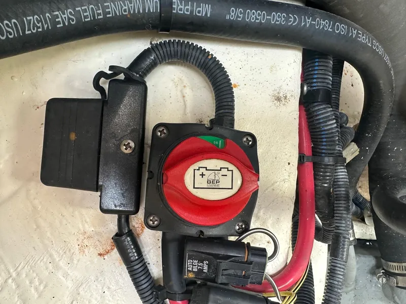 Slide: The Image of Battery switch and wiring in a 2015 Regal 1900 boat. - 16