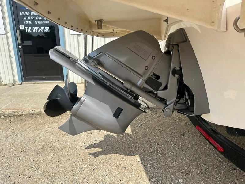 Slide: The Image of Close-up of a 2015 Regal 1900 boat's Volvo Penta outdrive and propeller. - 22