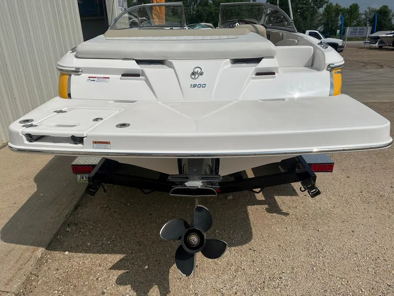 Slide: The Image of Rear view of a 2015 Regal 1900 boat on a trailer. - 3