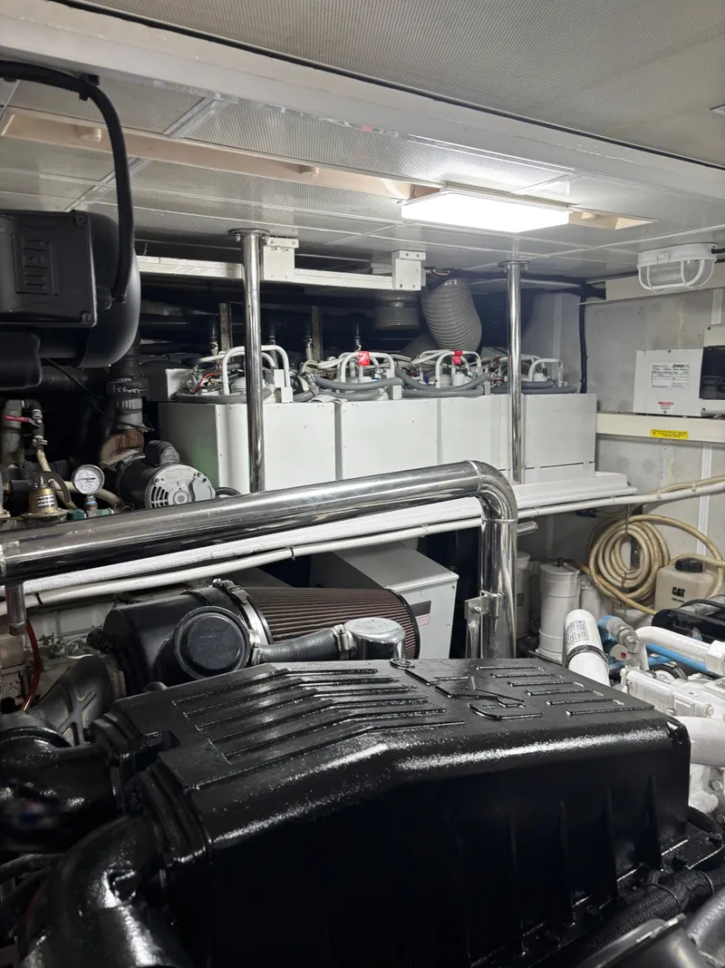 Slide: The Image of Engine room of 2009 Horizon Vision 74 yacht with machinery and equipment. - 25