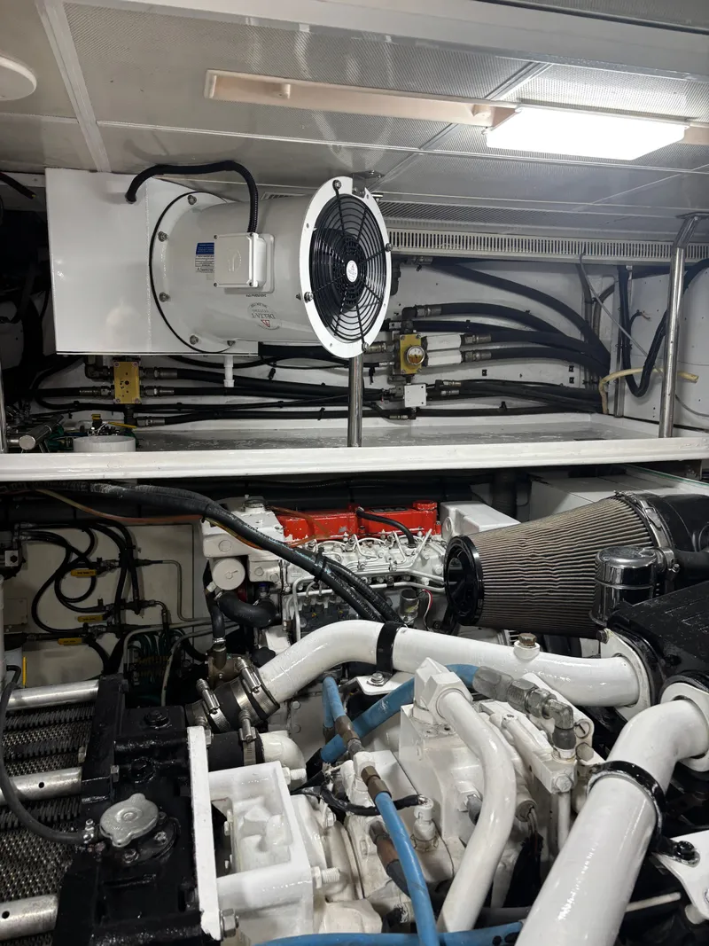Slide: The Image of Engine room of 2009 Horizon Vision 74 yacht, featuring complex machinery and ventilation system. - 33