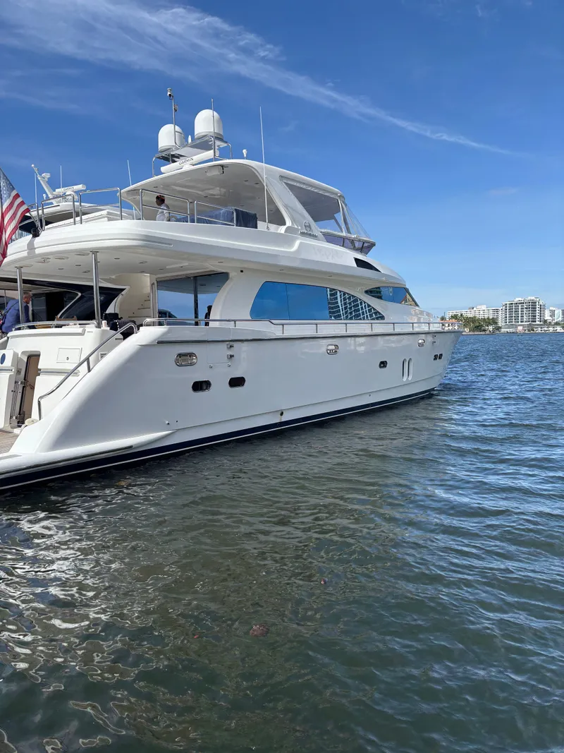 Slide: The Image of Luxurious 2009 Horizon Vision 74 yacht docked on a sunny day. - 8