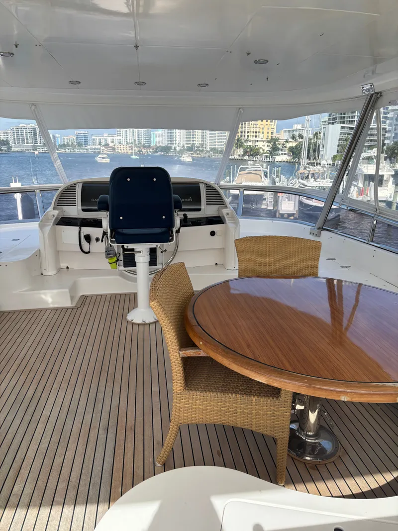 Slide: The Image of Luxurious Horizon Vision 74 yacht deck with seating and scenic marina view, 2009 model. - 9