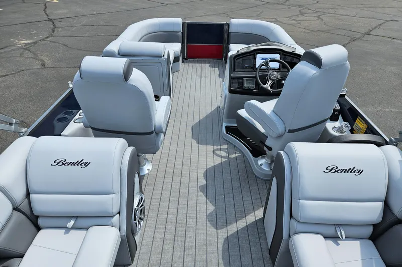 Slide: The Image of 2024 Bentley Pontoons Elite 220 Admiral interior with luxurious seating and modern helm. - 21