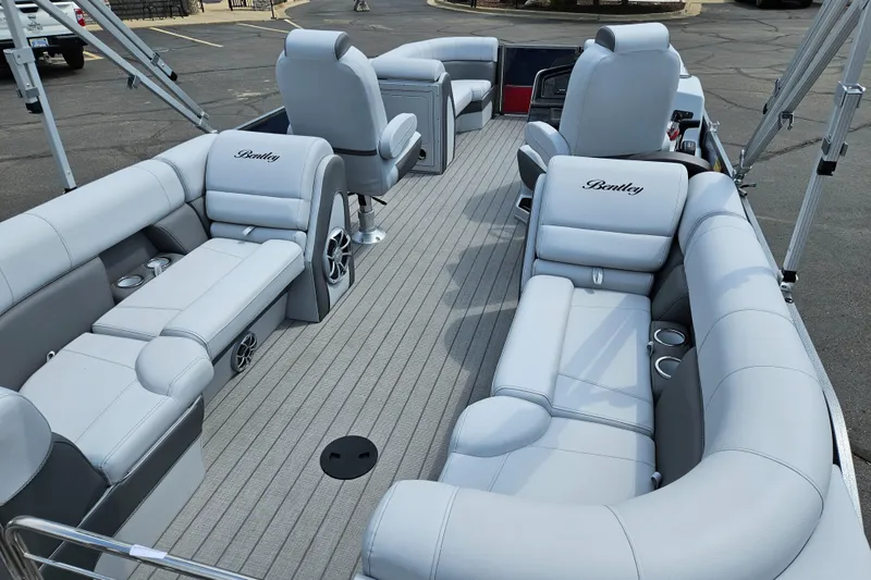 Slide: The Image of 2024 Bentley Pontoons Elite 220 Admiral interior with luxurious seating and modern design. - 22