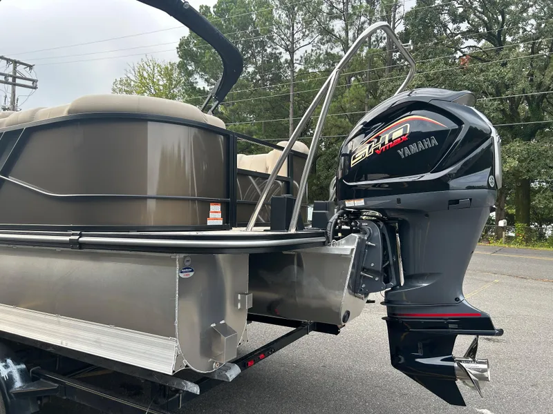 Slide: The Image of 2023 SunCatcher Fusion 324RC pontoon boat with Yamaha outboard motor. - 5