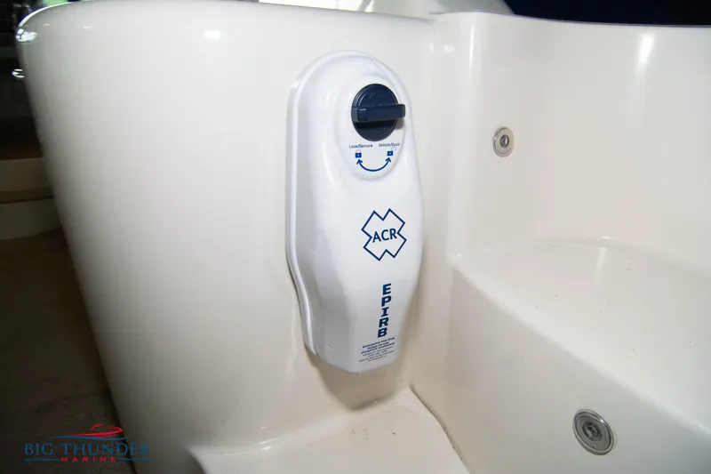 Slide: The Image of EPIRB device on a 2013 Sea Ray 540 Sundancer yacht. - 26