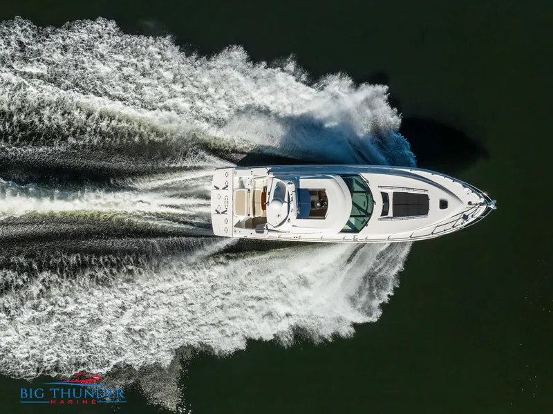 Slide: The Image of Aerial view of 2013 Sea Ray 540 Sundancer yacht cruising on water. - 10