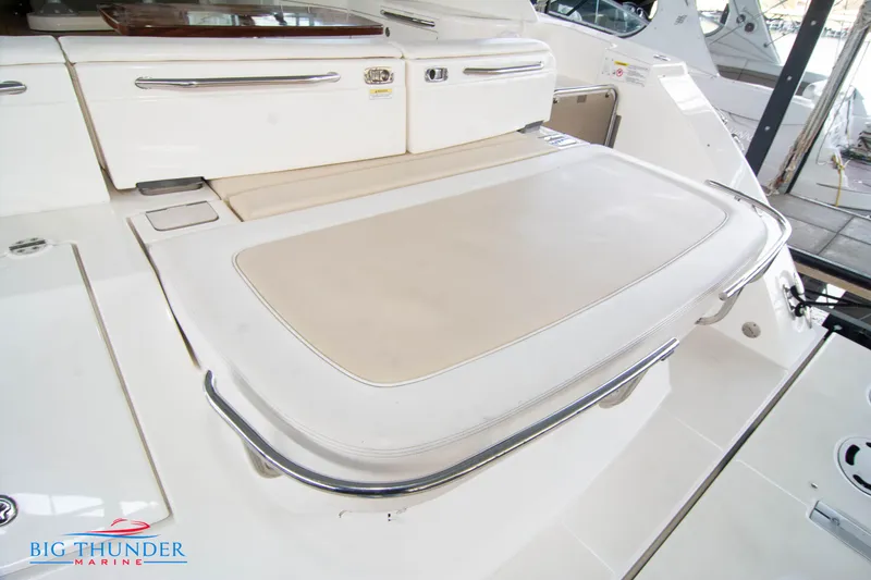 Slide: The Image of 2013 Sea Ray 540 Sundancer swim platform with storage compartments. - 14