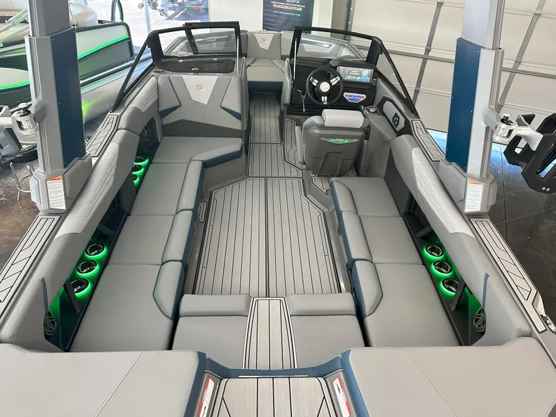 Slide: The Image of 2024 Nautique S23 boat interior with spacious seating and modern design. - 10