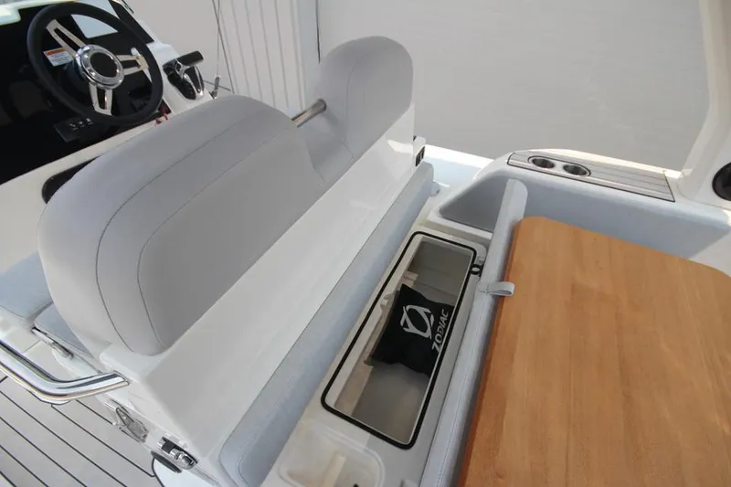Slide: The Image of 2024 Zodiac Medline 7.5 NEO 300hp boat interior with seating and storage. - 12