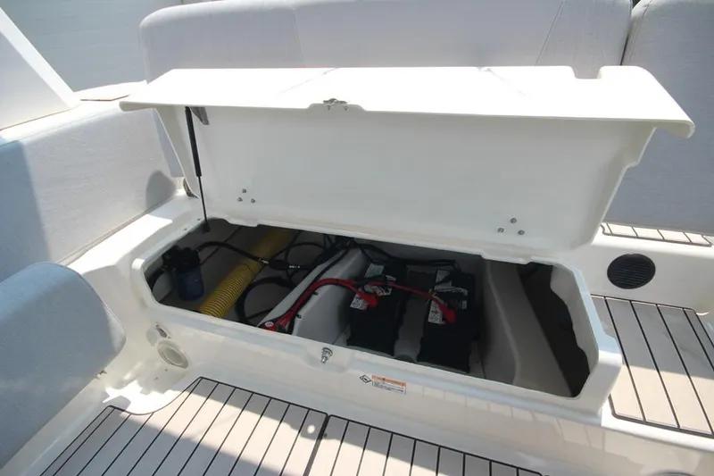 Slide: The Image of 2024 Zodiac Medline 7.5 NEO 300hp boat storage compartment with open lid. - 14