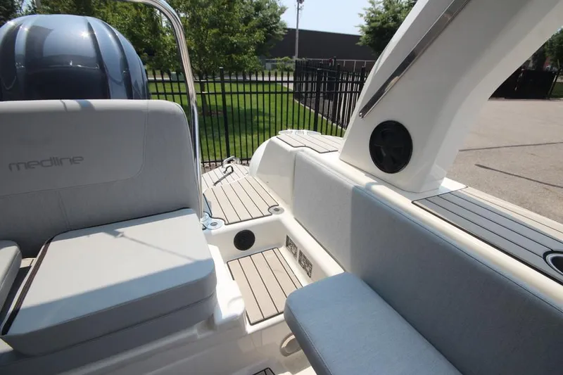 Slide: The Image of 2024 Zodiac Medline 7.5 NEO 300hp boat interior with seating and deck view. - 15