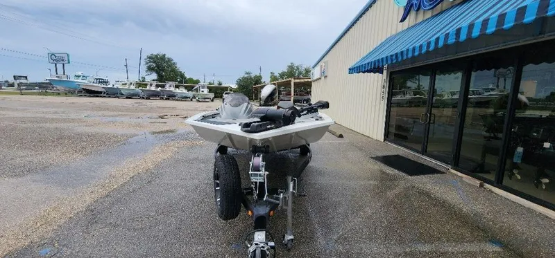 Slide: The Image of 2022 G3 Sportsman 1710 boat on trailer outside dealership. - 10