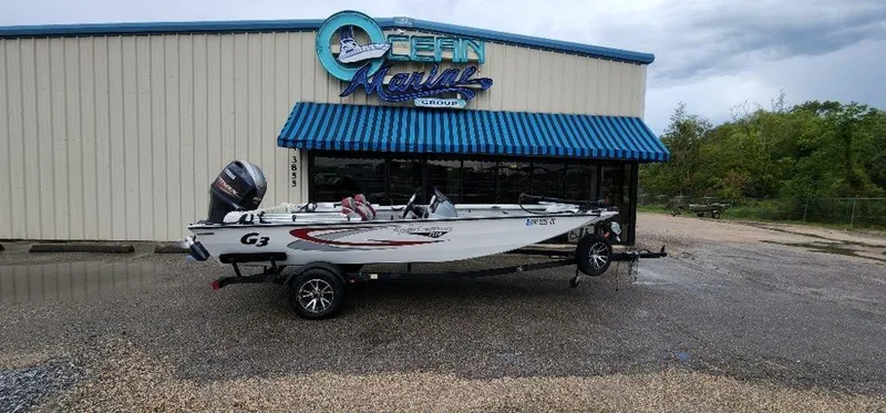 Slide: The Image of 2022 G3 Sportsman 1710 boat outside Ocean Marine building. - 11