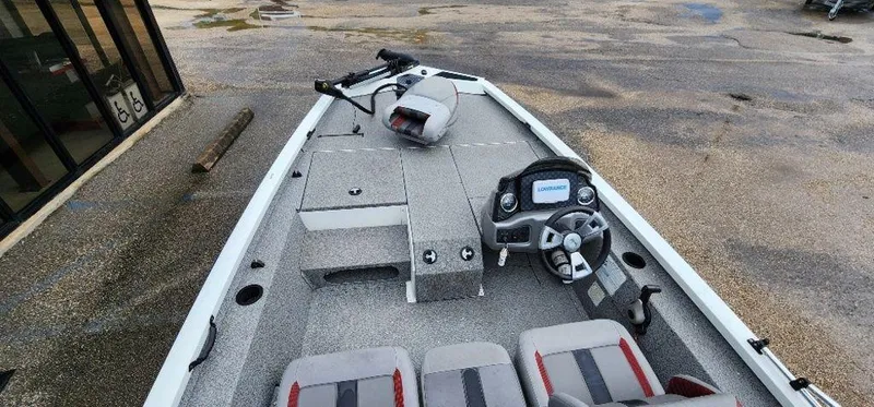 Slide: The Image of 2022 G3 Sportsman 1710 boat interior with steering console and seating. - 18
