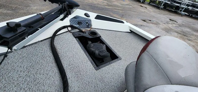 Slide: The Image of 2022 G3 Sportsman 1710 boat deck with seating and control panel. - 23